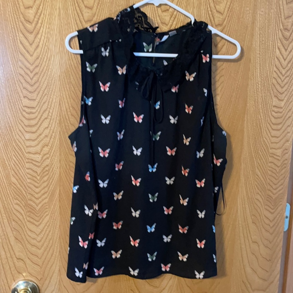 Sleeveless blouse size L